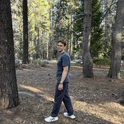 Joscha walking through a forest